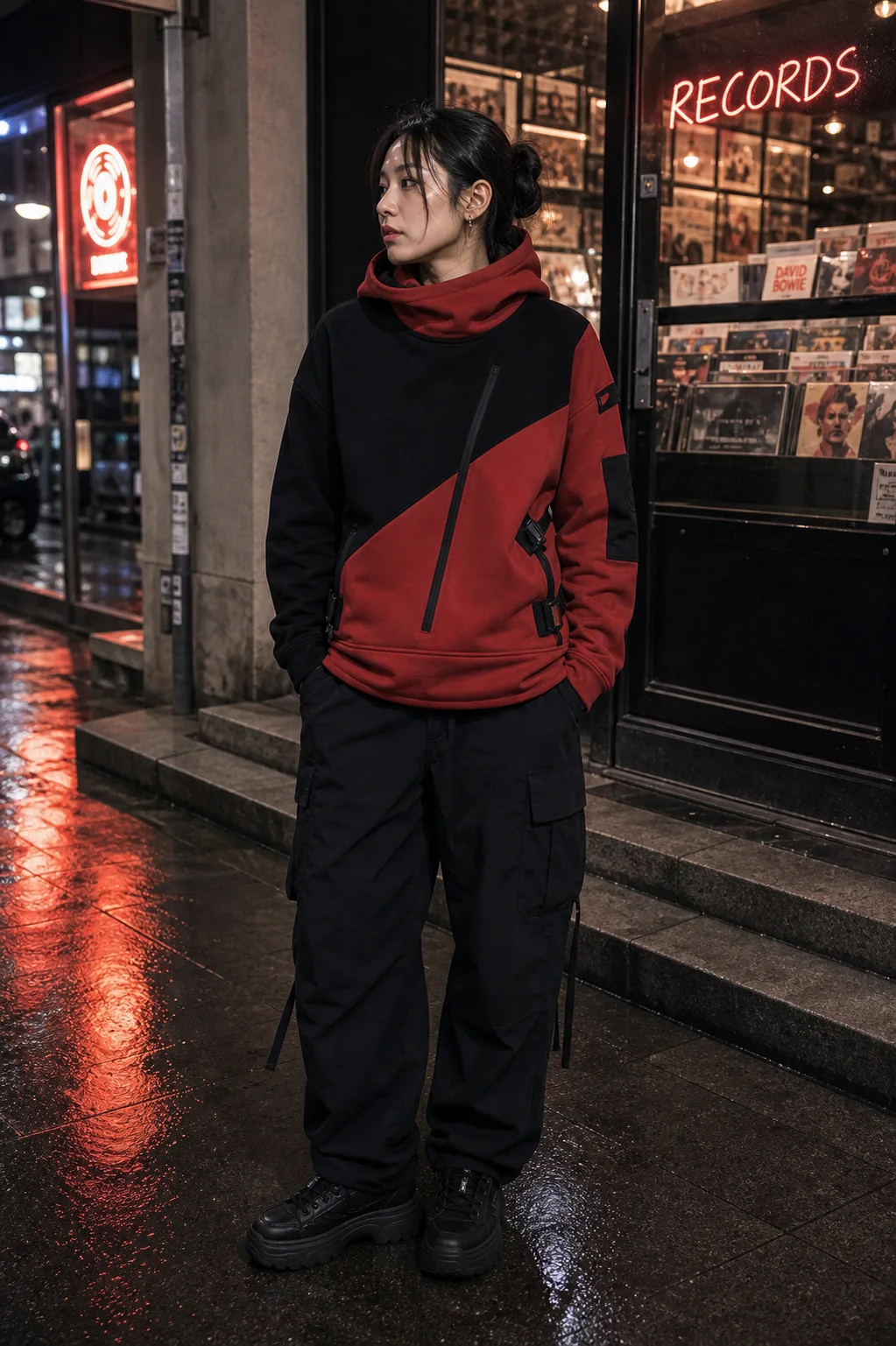 Seoul record shop styling image showing the Clothixpack CXP-H104 Cowl Technical Hoodie with black cargo pants and platform sneakers.