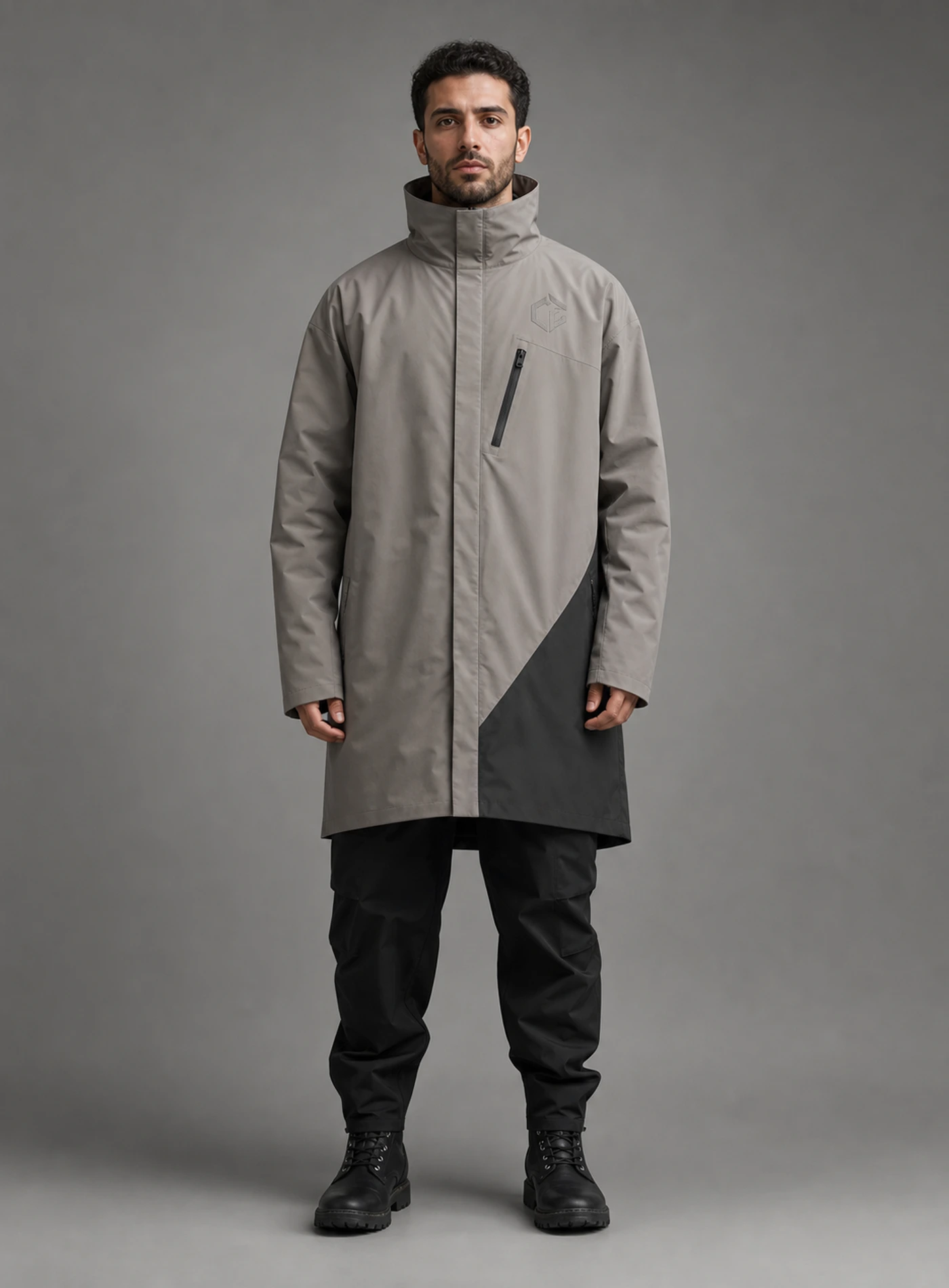 Drift Longline Jacket front view showing sandstone grey / charcoal Clothixpack technical construction
