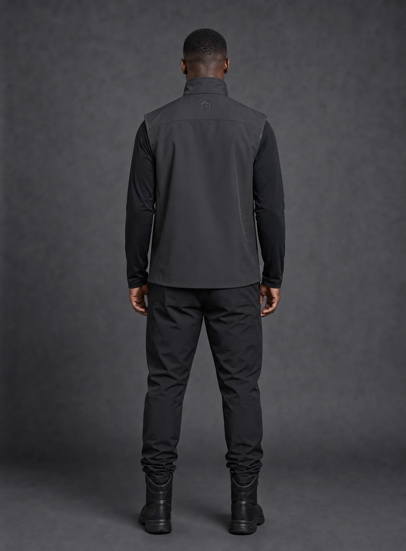 Vector Waterproof Vest back view with its distinct Clothixpack campaign model