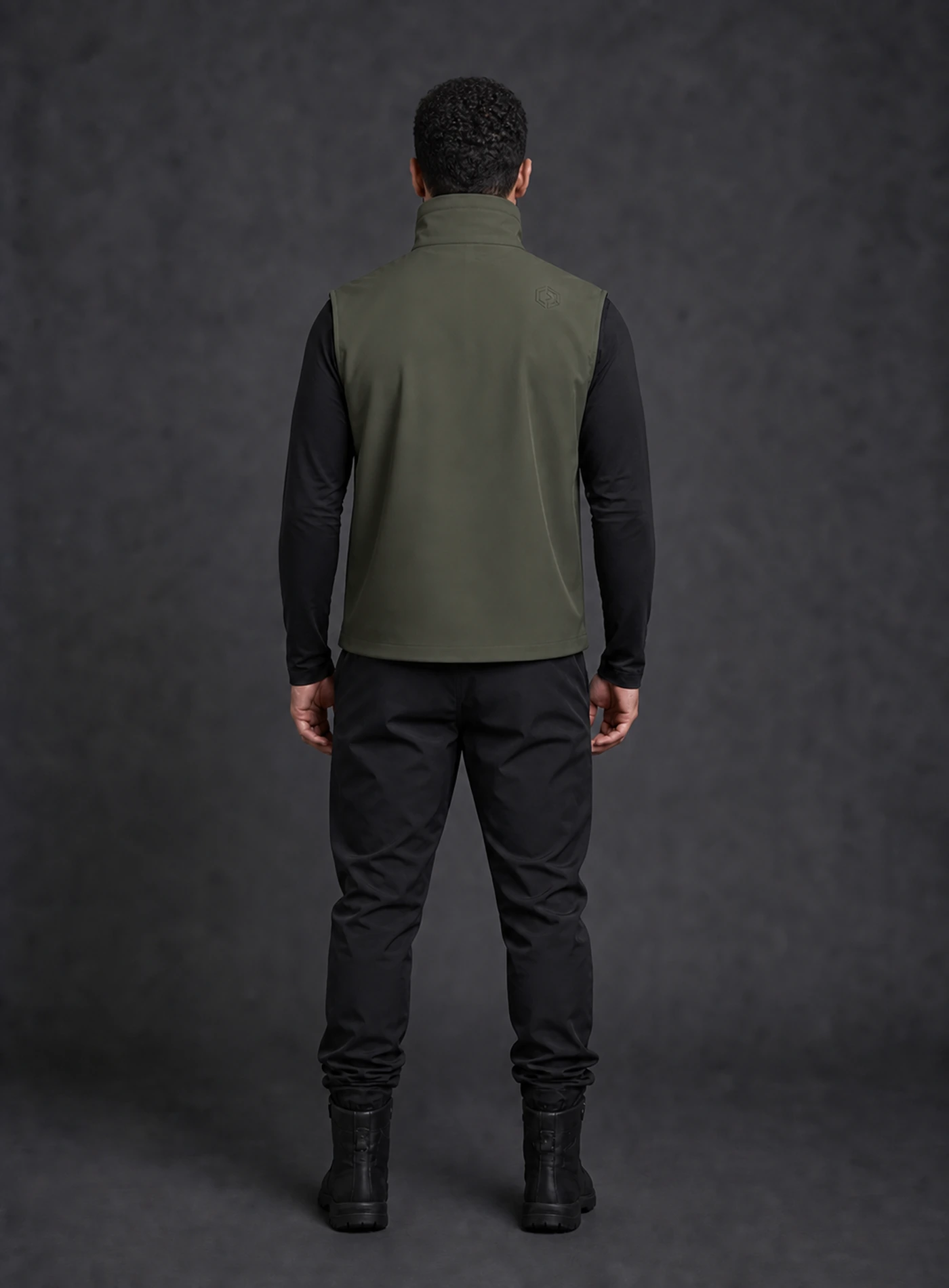 Moss Vent Vest back view with its distinct Clothixpack campaign model