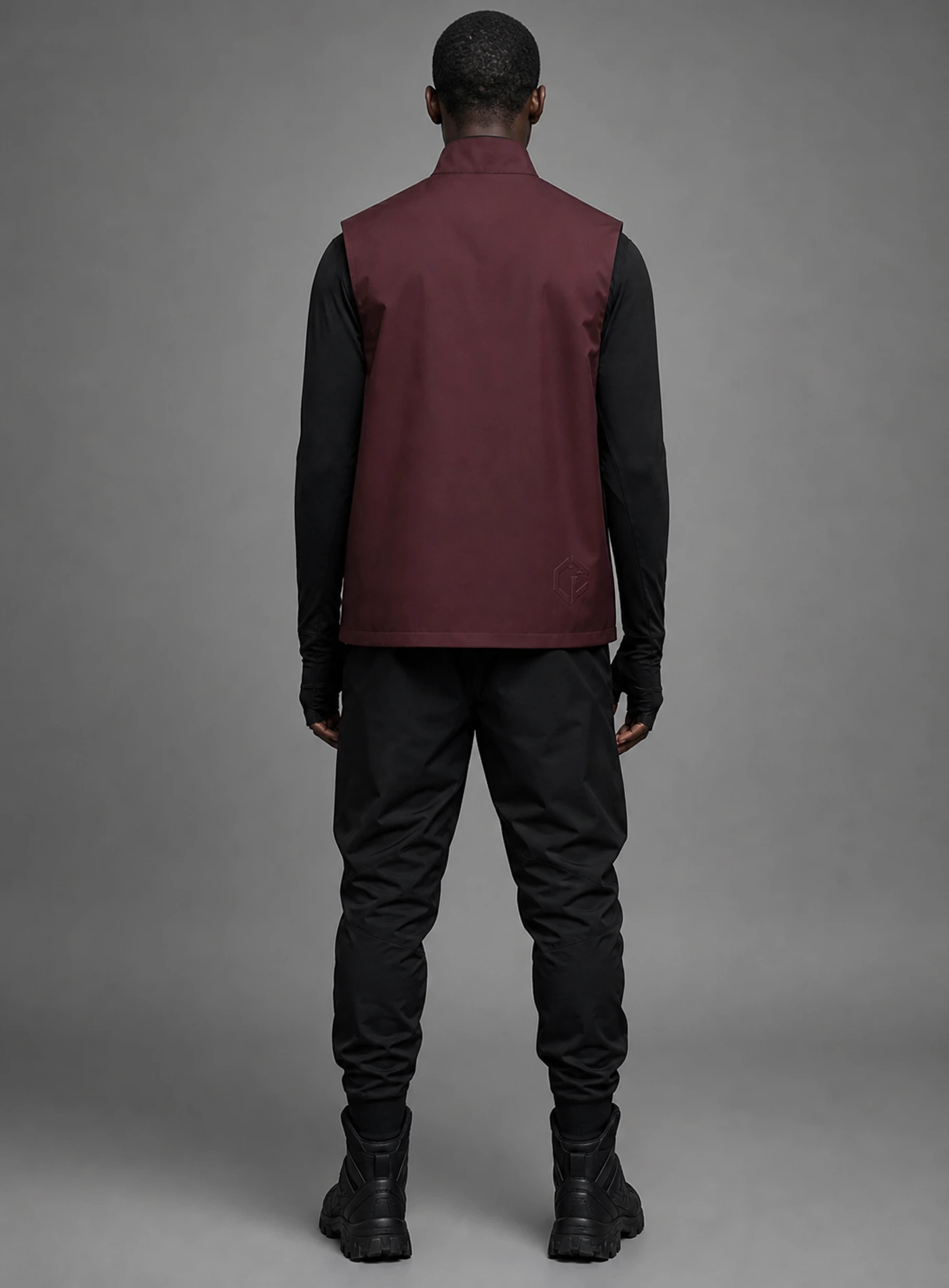 Oxblood Offset Vest back view showing matching Clothixpack construction and naturally integrated branding