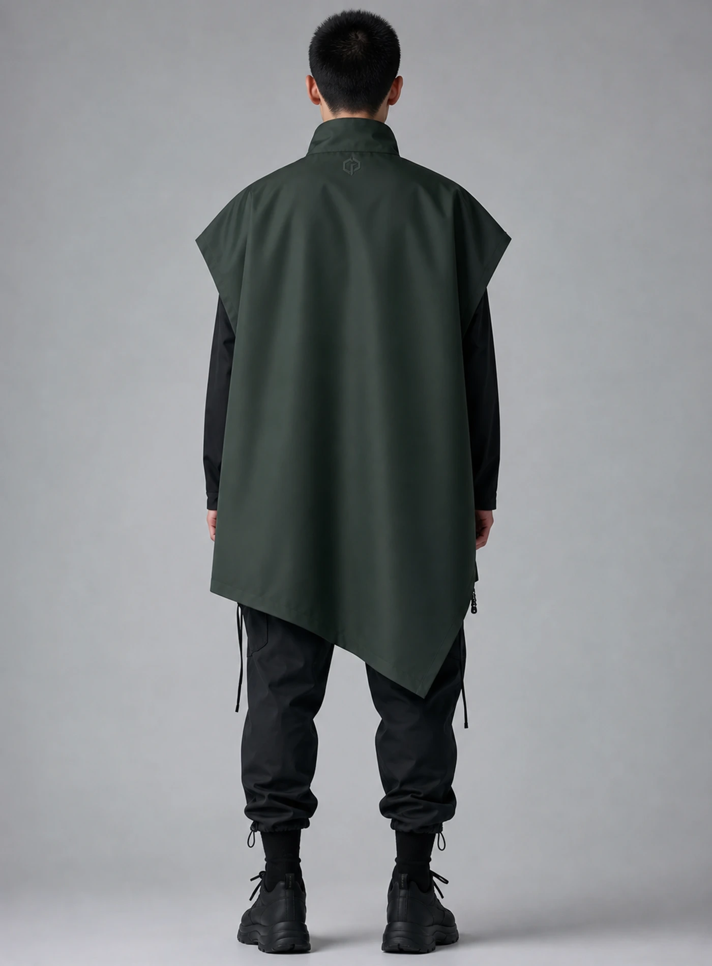 Pine Poncho Vest back view showing matching Clothixpack construction and naturally integrated branding